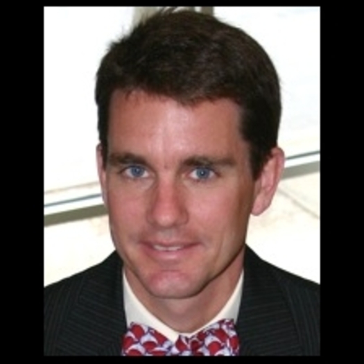 PHOTO: Head shot of Adam Searing courtesy of The White House.