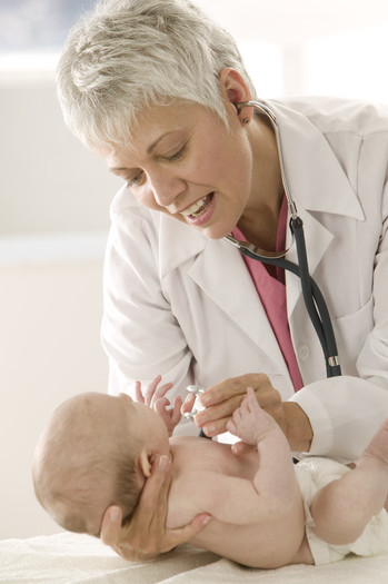 PHOTO: Doctor and baby. CREDIT: CDF-MN