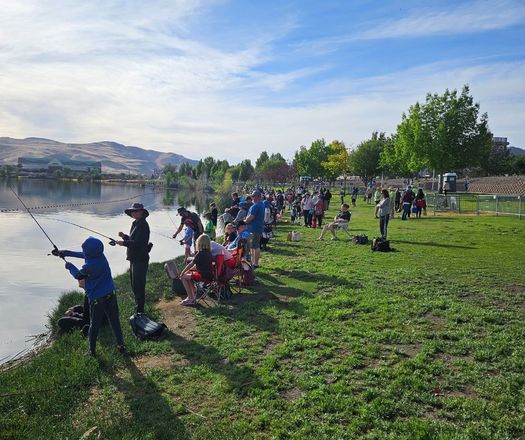 Nevada kids enjoy a free fishing day sponsored by the Rotary Club on June 14 at the Sparks Marina. (Jamie Roice-Gomes)<br />