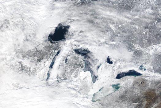 PHOTO: The near total freezeover of the Great Lakes during the brutal winter is impacting summer weather for millions of Wisconsinites because of the much colder water temperature of Lake Michigan. Photo credit: NASA