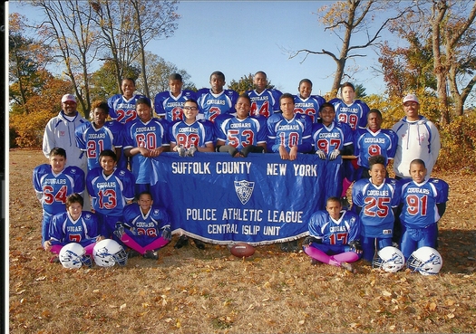 PHOTO: The Central Islip Cougars and their coaches are anxious about what impact illegal toxic dumping in or near a playground and recreation areas might have on their upcoming season. Photo courtesy Kenneth Cox.