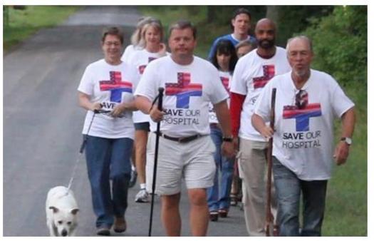 PHOTO: Adam O'Neal, center, mayor of Belhaven, N.C., will complete his walk from his hometown to Washington, D.C., on Monday. His aim is to call attention to the need for states to expand Medicaid, to cover more people and improve the financial stability of rural hospitals that treat them. Photo courtesy of O'Neal.