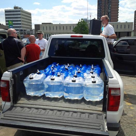 PHOTO: A convoy of trucks from Canada carrying hundreds of gallons of water crossed into Detroit on Thursday in a gesture of support for city residents whose water has been shut off in recent months. Photo credit: M. Barlow.