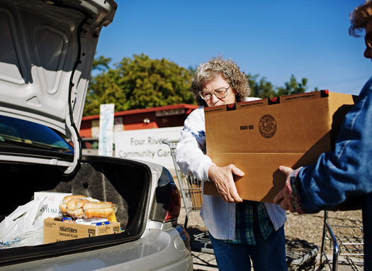 PHOTO: At Ontario's Next Chapter Food Pantry, emergency food boxes help SNAP dollars stretch further for local residents. A new national report says more rural households depend on SNAP benefits than those in urban areas. Photo credit: Daniel Root, PhotoForce.