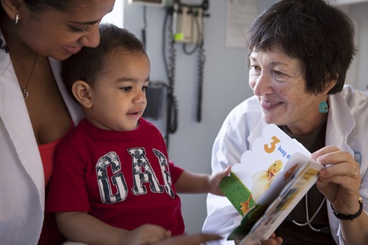 PHOTO: The national organization Reach Out and Read distributes books through pediatrician offices at children's well-check visits. Photo courtesy of Reach Out and Read.