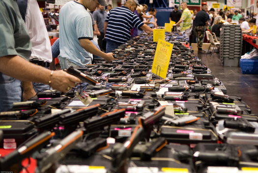 PHOTO: About 40 percent of the gun sales in Washington are private sales, without background checks, between individuals, online or at gun shows like the one in Texas pictured here. Only one of Washington's November ballot measures, I-594, would expand background checks. Photo credit: Glasgows/Wikimedia Commons.