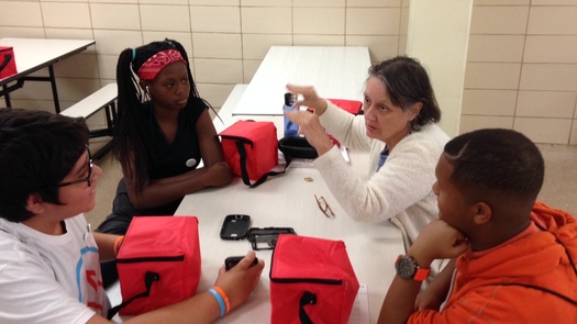 PHOTO: Randallstown High School students recently helped some non-tech-savvy Marylanders learn computer basics at an AARP Maryland event. Photo courtesy of AARP Maryland.