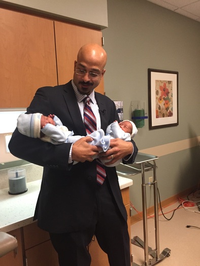 PHOTO: Dr. Corey Iqbal holds 1-month-old twins Kerlin and Orlando Morales-Botello, the first patients at Children's Mercy Hospital in Kansas City, Mo., to undergo a state-of-the-art procedure to treat a potentially fatal complication while in-utero. Photo courtesy of J. Salazar.