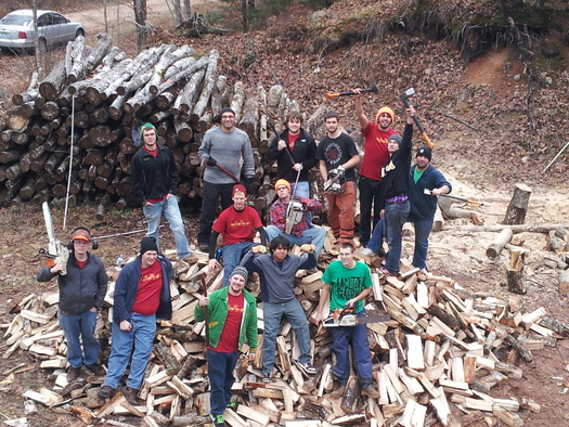 PHOTO: Students from Michigan Technological University lent a hand chopping wood to help keep the elderly warm this winter, one of thousands of this year's Make a Difference Day projects. Photo credit: R. Jansen.