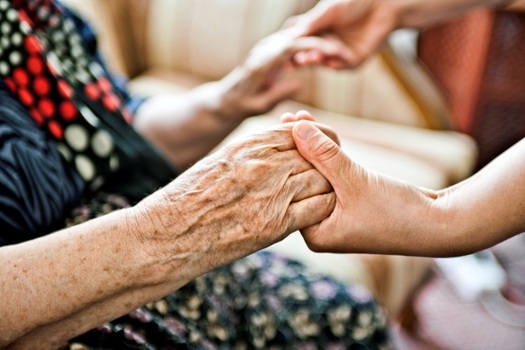 PHOTO: Caregivers lend much more than a helping hand to help those they love, which is why AARP is reaching out to support - and honor - the role they play in their families and their community. Photo courtesy AARP. 