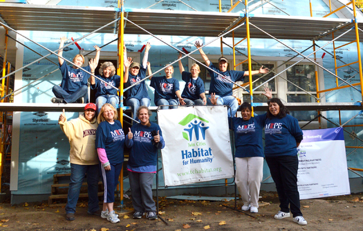 PHOTO: About a dozen MAPE members traded their state agency cubicles for a day on a construction site with Habitat for Humanity, building a home for a family in need. Photo credit: MAPE.