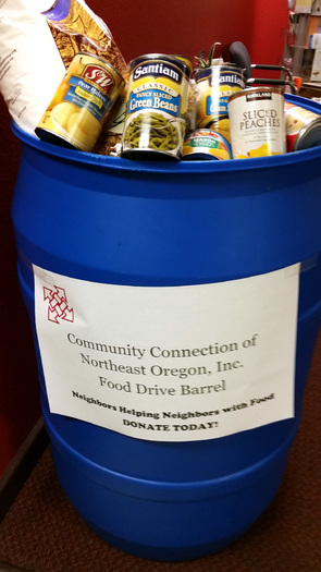 PHOTO: One important aspect of planning a charitable food drive is determining how to get heavy barrels from the donation site to the local food bank. Photo courtesy Community Connection of Northeast Oregon.