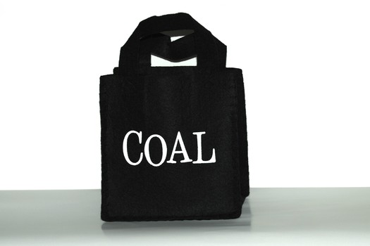 PHOTO: Like a lump of coal in your stocking, a holiday scam is something nobody wants to fall victim to. But experts say with shoppers estimated to spend upwards of $619 billion on gifts this year, scammers are stepping up their tricks to rip people off. Photo credit: mensatic/morgufile.