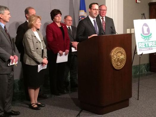 PHOTO: AARP Minnesota State Director Will Phillips (at podium) joined lawmakers to introduce a proposal to eliminate state income taxes on Social Security benefits. Photo credit: Seth Boffeli.