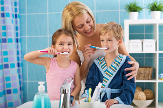 PHOTO: Getting kids to brush their teeth and floss, and reminding parents of how the importance of oral health, are the goals of National Children's Dental Health Month. Photo courtesy of the Centers for Disease Control and Prevention.