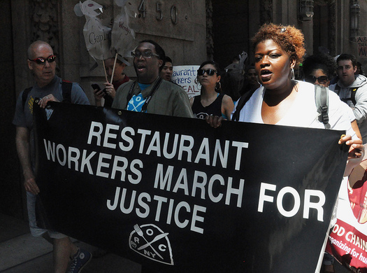 PHOTO: Gov. Cuomo announced this week New York would raise minimum wage by $2.50 for waiters, bartenders and others who work for tips. Groups which lobbied for the change welcome the news, but say their goal is much larger. Photo credit: Michael Fleshman.