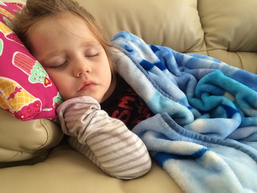 PHOTO: Caring for a sick little one is hard for many Michiganders who do not have paid sick leave time at work. But a new poll finds the majority of voters would support paid-sick-leave policies. Photo credit: M. Kuhlman