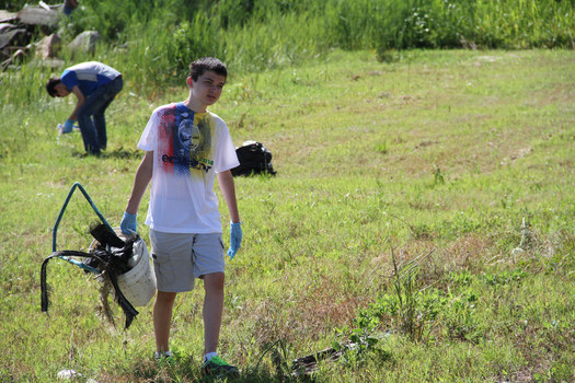 PHOTO: Picking up trash is part of what has become the world's largest civic observance: Earth Day. Thousands of people across Minnesota are now making plans to take part in the 45th annual Earth Day, with events to be held on and around April 22. Photo credit: U.S. Army Corps of Engineers.