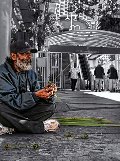 PHOTO: A homeless man seeks shelter in downtown Miami, where the City Commission has delayed a decision on whether to outlaw camping on public property for another month. Photo credit: xynntii/Flickr.com.