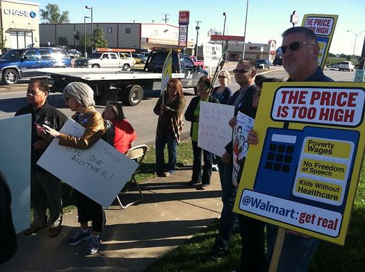 PHOTO: Workers plan to go on strike demanding living wages on tax day. Some employees have made gains in recent weeks when Walmart and McDonalds announced pay raises. Photo credit: Benjamin G. Robinson/Wikimedia Commons.