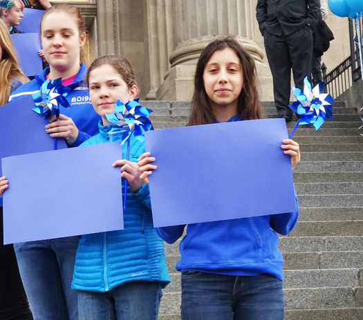 PHOTO: About 200 people gathered on the Capitol steps in Boise to kick off Child Abuse Prevention Month in Idaho yesterday. Photo credit: Deborah C. Smith