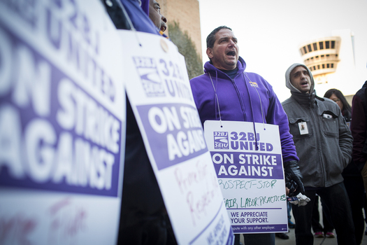 PHOTO: Some Philadelphia airport workers are protesting their employers' failure to meet the $12 per hour wage standard set by the city council. Photograph by Matt Stanley Photo.