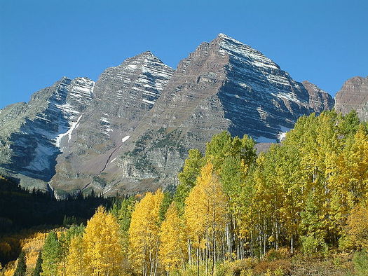 PHOTO: Proposals to give the state jurisdiction over federal public lands in Colorado worked their way through the legislature this week. Critics are concerned that if the state takes over, Coloradans might not be able to access national parks and areas such as the Sangre de Cristo Mountains, Indian Peaks and Maroon Bells (pictured). Photo credit: Jesse Varner/Wikimedia Commons.