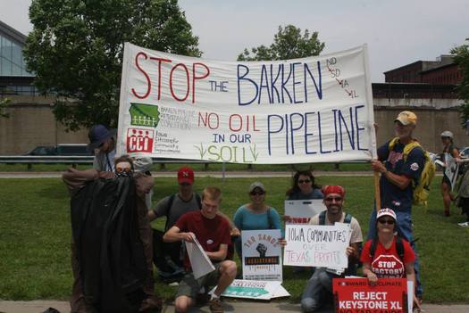 Opponents of the proposed Bakken oil pipeline says it would put the state's soil, waterways and communities at risk. Credit: Iowa Citizens for Community Improvement.