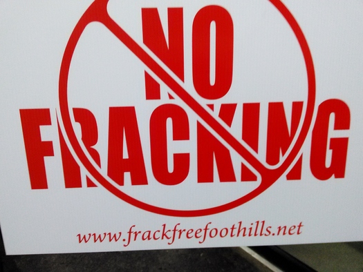 Landowners concerned about the impact of deep-well fracking in Kentucky are displaying signs like this one as the state moves forward with the controversial method of oil and gas drilling. Credit: Greg Stotelmyer.