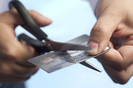 According to a recent analysis, Americans paid off $35 billion in credit card debt in the first quarter of this year. Credit: MarsBars.