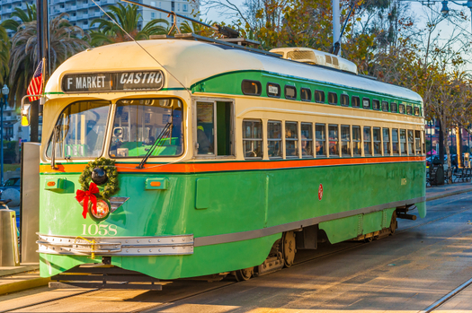 A Muni streetcar along the Embarcadero in San Francisco during the December holiday season. Credit: Luciano Mortula/iStockphoto.