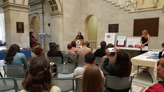 Amy Whitcomb Slemmer and other health care advocates released a new study at the State House showing many Hispanics in the Commonwealth missing out on insurance coverage. Courtesy: Health Care For All