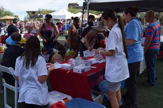 Expanded Medicaid coverage and outreach, like this Step Up for Kids event in Las Vegas, are a critical reason why Nevada saw the biggest jump in the nation in a new report for providing access to uninsured kids. Courtesy: Nevada Institute for Children's Research and Policy at UNLV.