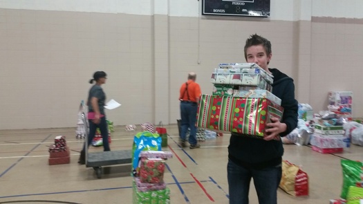 Volunteers help sort and deliver holiday gifts for the Salvation Army in Gary, Indiana. (Veronica Carter)