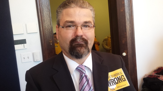 Roanoke, Va., grocery store worker Steve Meador says he gets paid nearly $2 less an hour than an exact peer in West Virginia because his state has a right-to-work law. (Dan Heyman)