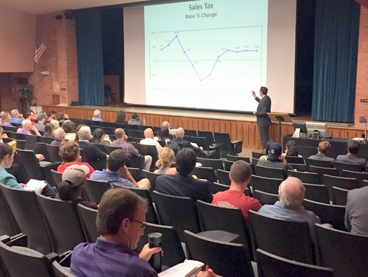 Arizona State Rep. Justin Olson goes over budget figures with constituents attending a state budget  forum in Tucson last weekend. (Michelle Crow/Childrens Action Alliance) 