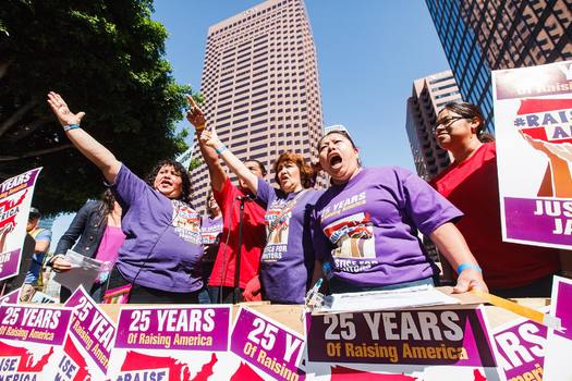The Justice for Janitors movement protested last month in Los Angeles. It holds rallies across the state today (Tues.) for International Women's Day. (Ian Paredes/SEIU)