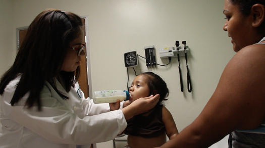 Dr. Carolina Quezada treats a patient at a community health center in Visalia, Calif. (Family Healthcare Network)