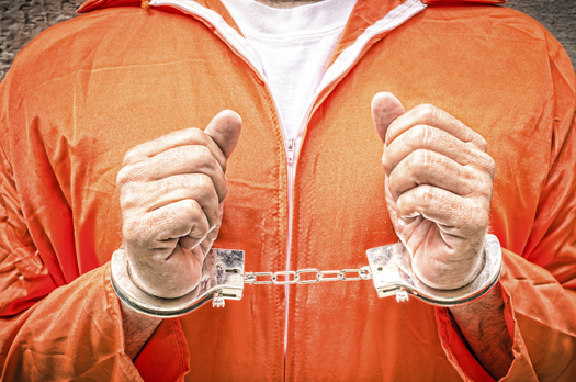 Death penalty opponents hold a vigil at the South Dakota State Penitentiary on Good Friday. (iStockphoto)