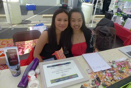 Cat Bao Le, left, is pictured with another member of the Southeast Asian Coalition as they conducted outreach at the Annual Dragon Boat Festival in Charlotte. (Le)