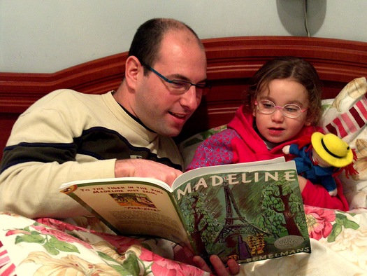 A University of Maine professor says families don't have to spend money on videos to introduce babies and young children to reading. It's as simple as sitting down with them daily to enjoy a book. (Ldorfman)