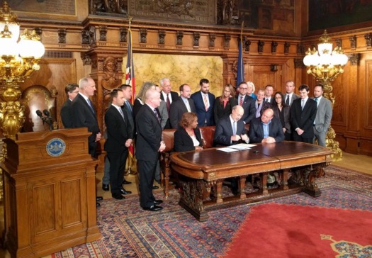 Gov. Tom Wolf signs executive orders banning discrimination against LGBT people. (Equality Pennsylvania) 