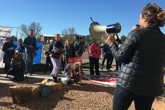 Protesters gathered in Santa Fe on Wednesday to call for the Bureau of Land Management to halt the sale of oil and gas leases on public lands. (WildEarth Guardians)