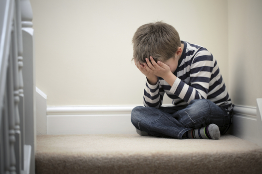 A new report says about 17,000 South Dakota children are facing more obstacles in their young lives as a result of a parent's incarceration. (iStockphoto)