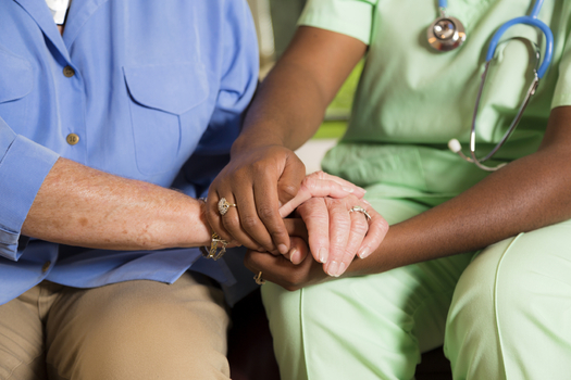 Some health-care advocates say Illinois' new overtime pay ban for home-care workers already is reducing services for people with disabilities. (iStockphoto)