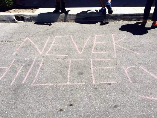 Chalk protests were left by Sen. Bernie Sanders' supporters in front of Nevada Democratic Party headquarters on Sunday. (Adryenn Ashley)