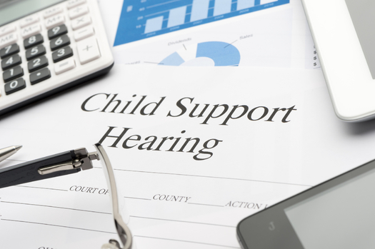 Thousands of North Dakota parents who are behind in child support payments are getting some unique help to catch up. (iStockphoto)