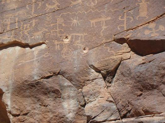 Bullet holes left by vandals in the rock at Gold Butte, marring ancient petroglyphs. (Christian Gerlach/Sierra Club)
