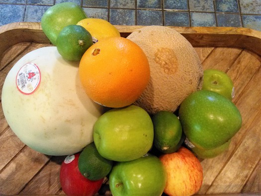 Shopping for fresh fruits and vegetables through Farmacy, an innovative healthy eating program. (Greg Stotelmyer)