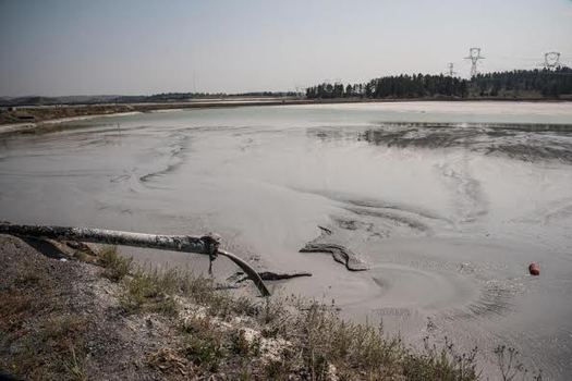 A coal ash sludge pond at the Colstrip coal-fired power plant. (Alexis Bonogofsky)